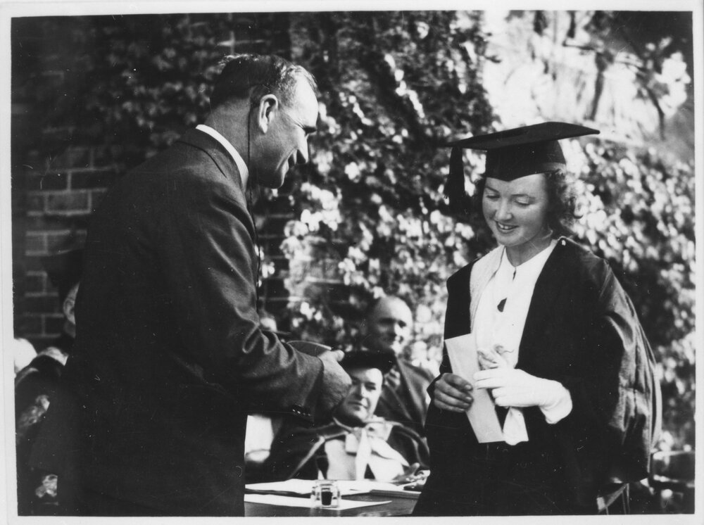 Mr D H Drummond, making presentation to a student at graduation