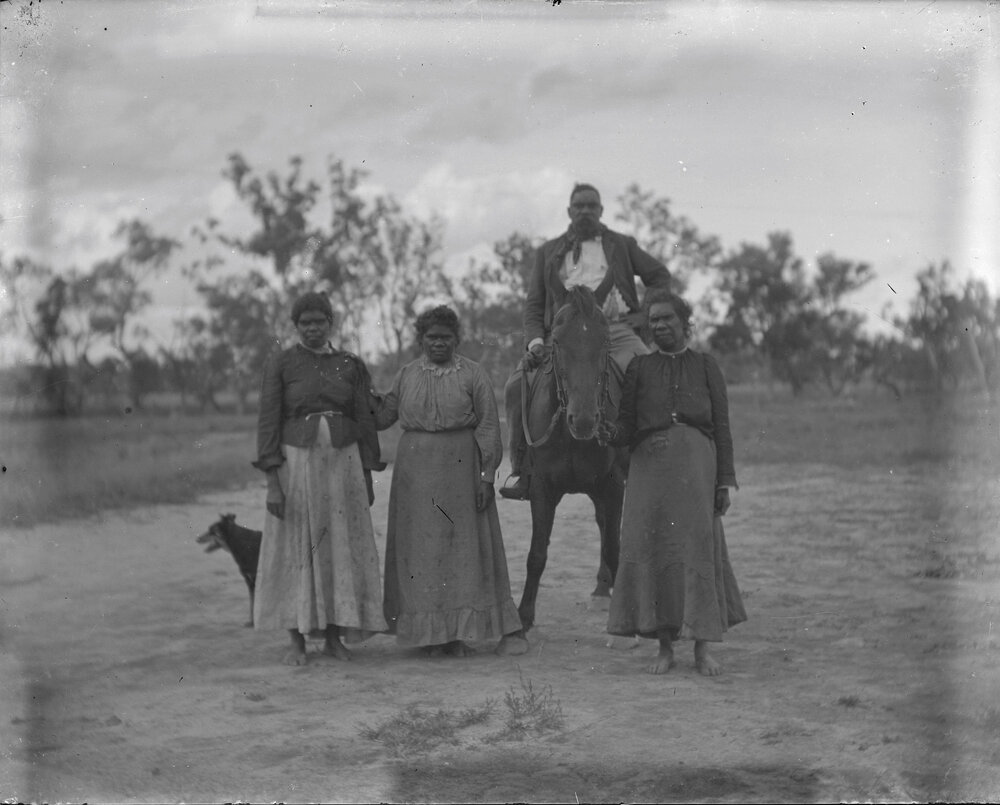 Three Aboriginal women and a man on a horse