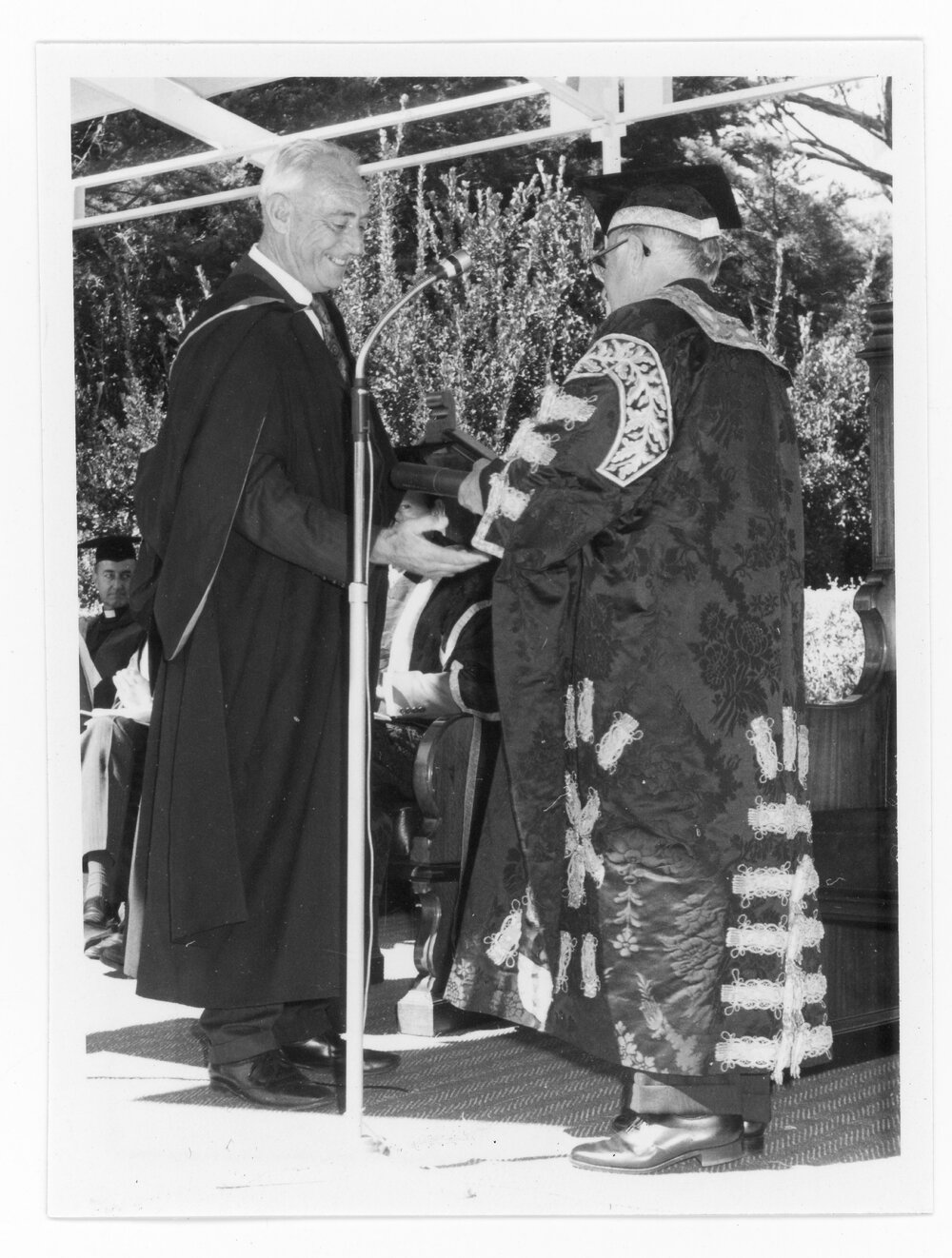 Graduation, Conferring a degree