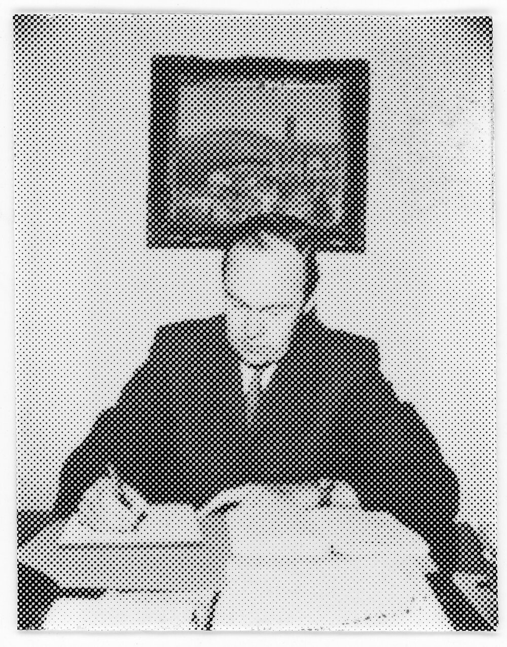 Professor Lazenby signing documents