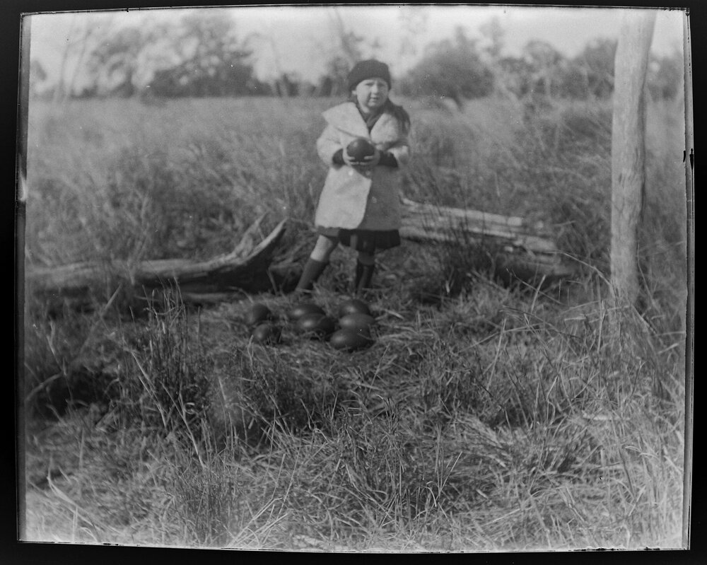 Child with Emu eggs