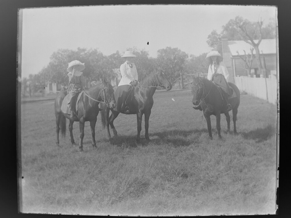 Three women on horseback
