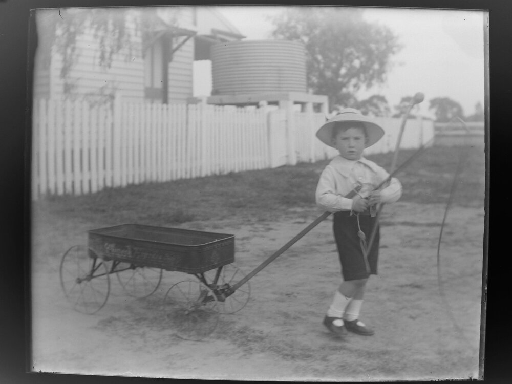 Boy pulling a wagon