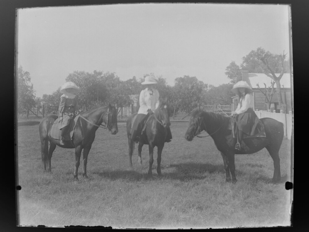 Three women on horseback