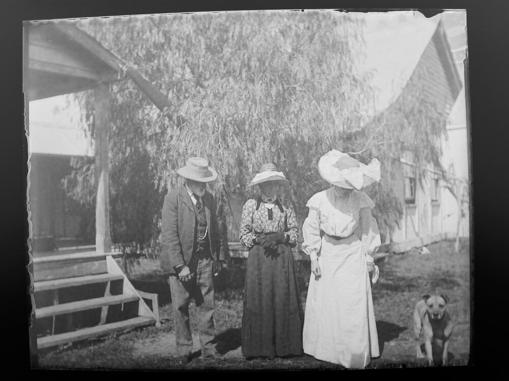 Barronga Group [Two women, a man and a dog standing outside]