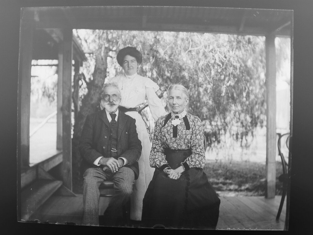 Barronga group sitting on a verandah 