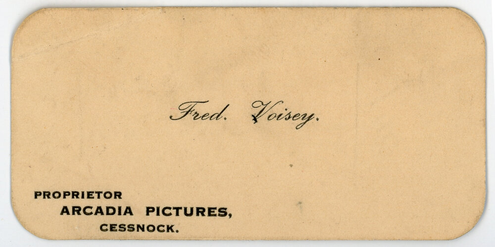 Name tag, Fred Voisey, Proprietor, Arcadia Pictures, Cessnock