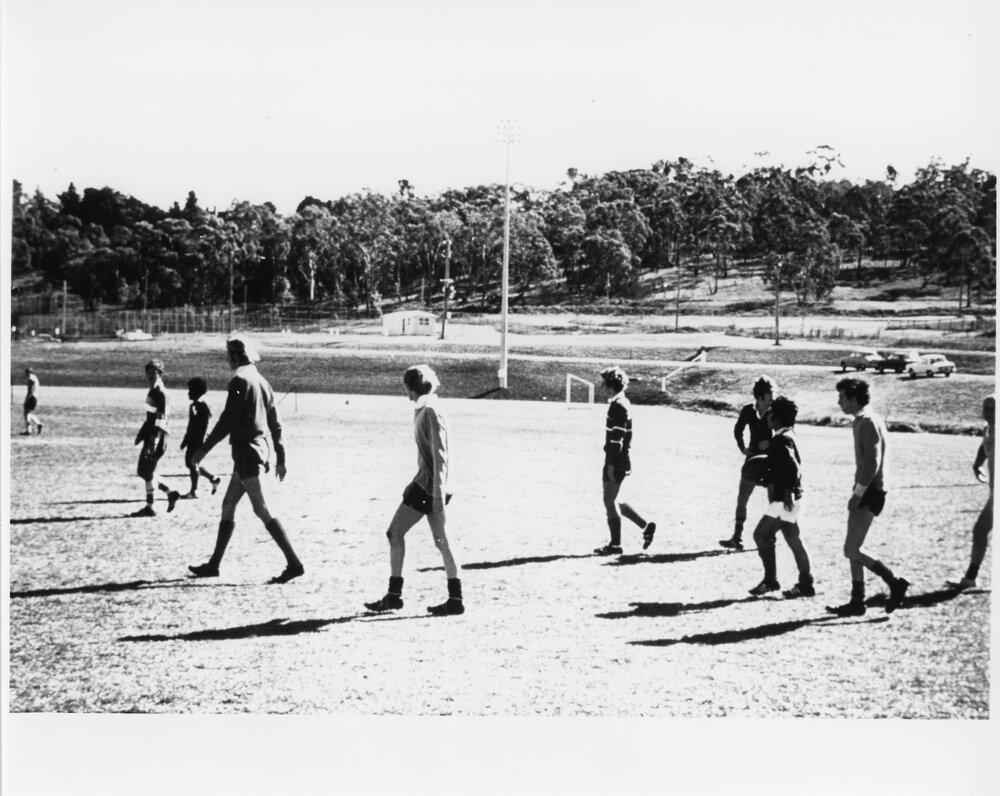 Wright College football players on a sporting field