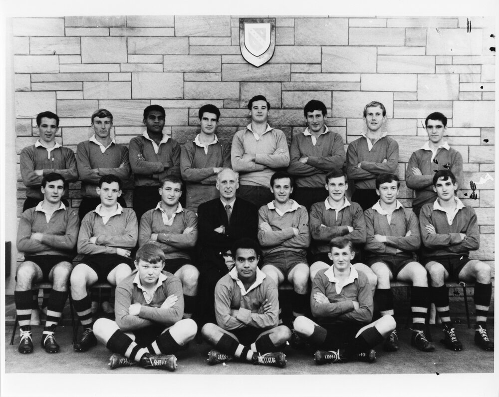 Wright College football team beneath the Wright College crest