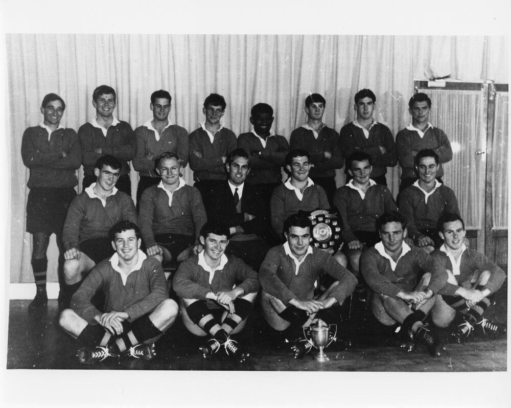 Wright College football team with cup and trophy