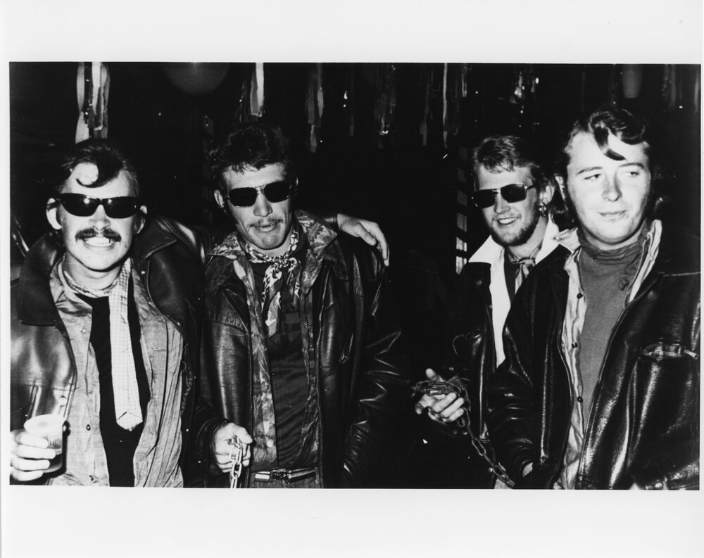 Wright College costume party, four men in leather jackets
