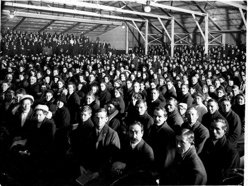 Large gathering of people inside Woodward &amp; Purkiss' building in Marsh Street (Olympia Skating Rink), c. 1915