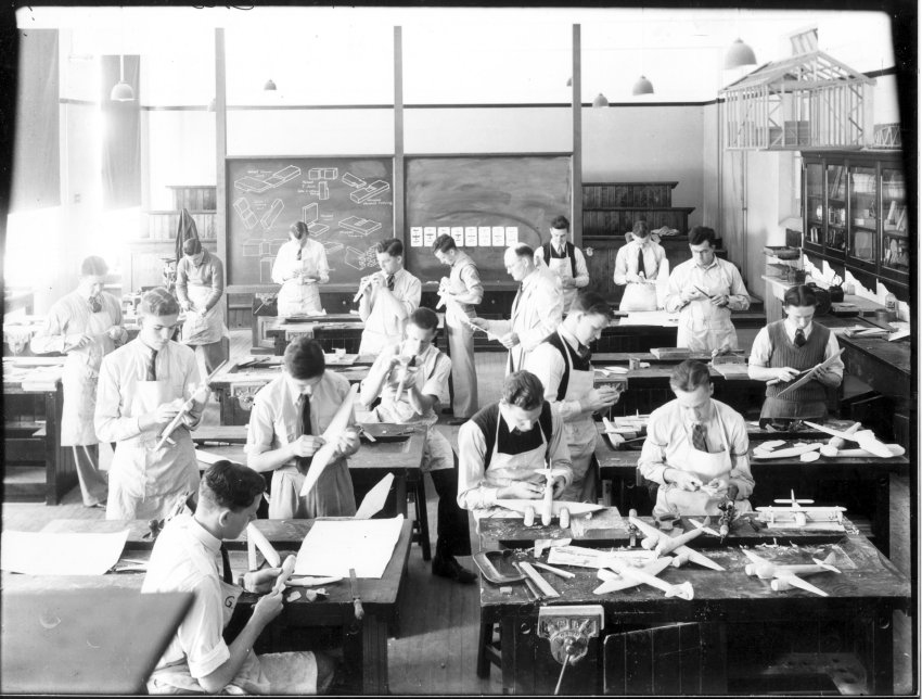 Armidale Teachers' College, H.W. Oxford with students making aircraft models, 1941