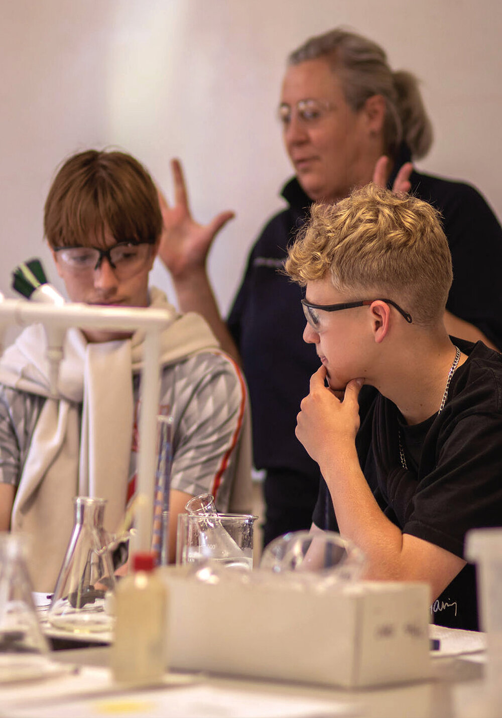 High school students at an Experience Day chemistry session with UNE Lecturer Erica Smith
