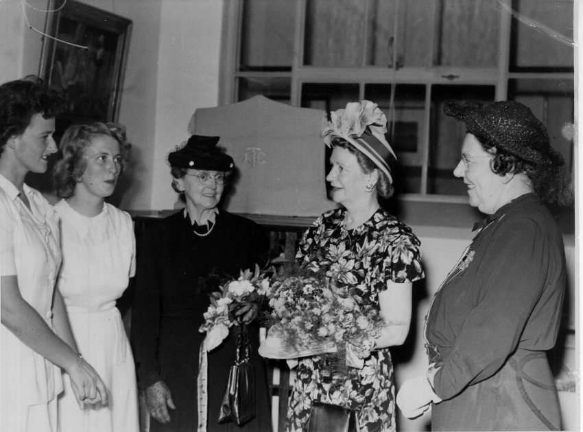 Armidale Teachers' College: Lady McKell receives a bouquet in the Library, 1949