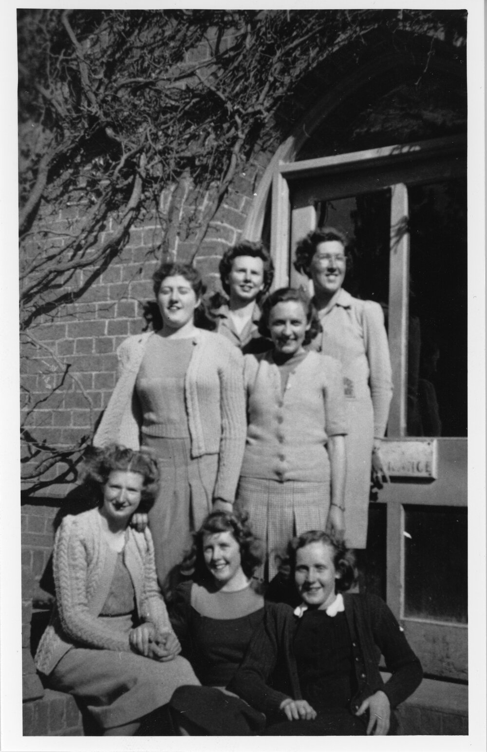 N.E.U.C. admin staff outside Booloominbah, 1945