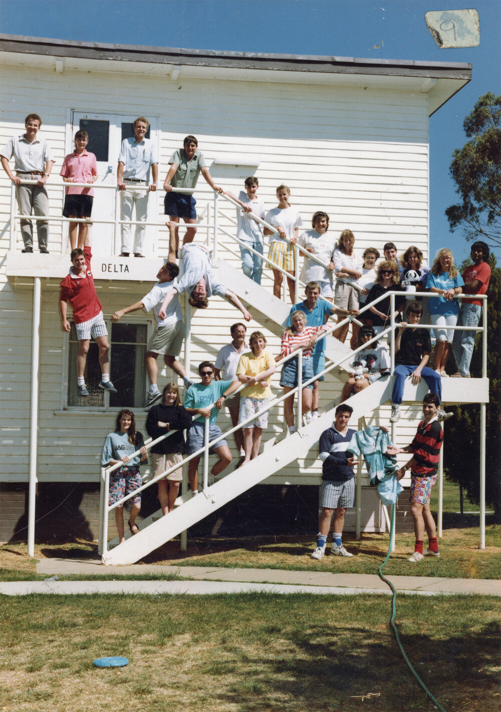 Delta Block student group standing on stairs, Wright College