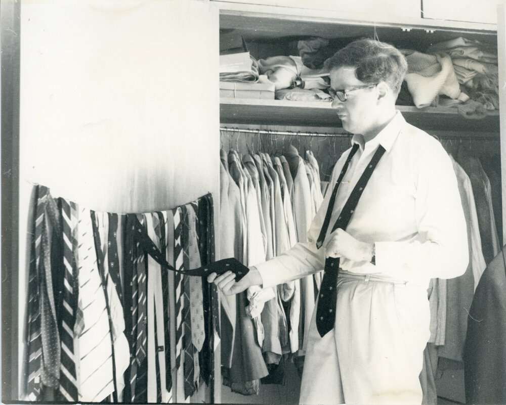 John Ryan looking at ties