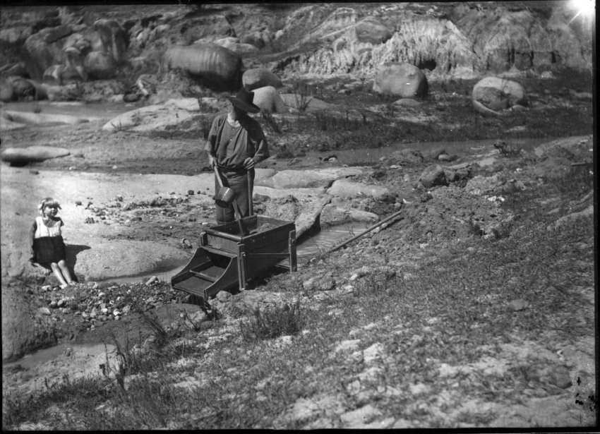 Gold mining at Rocky River using a cradle