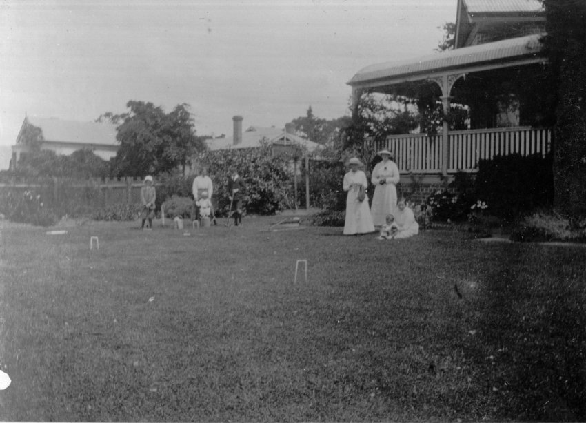 Photo of a group playing croquet