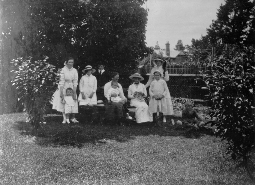 Women and children in a garden