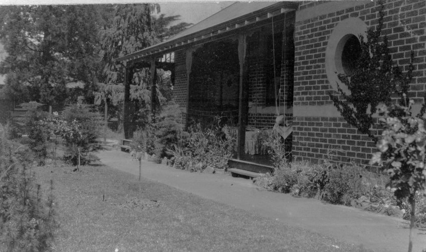 Photo of unidentified house and garden