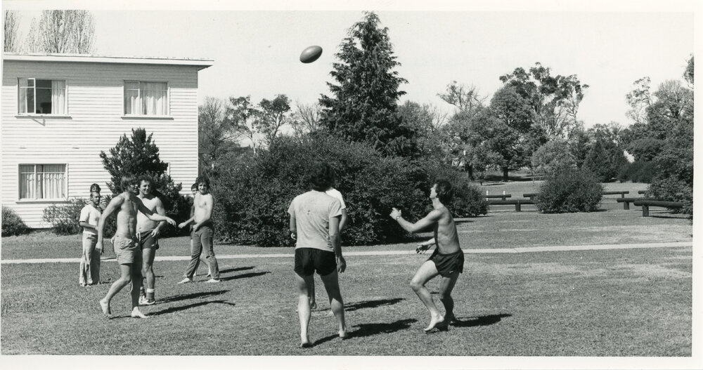 Wright College residents playing touch football, 1981