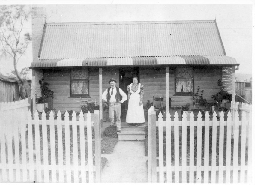 Mr and Mrs A. McWatters outside their 4-roomed miner's cottage, Hillgrove, NSW