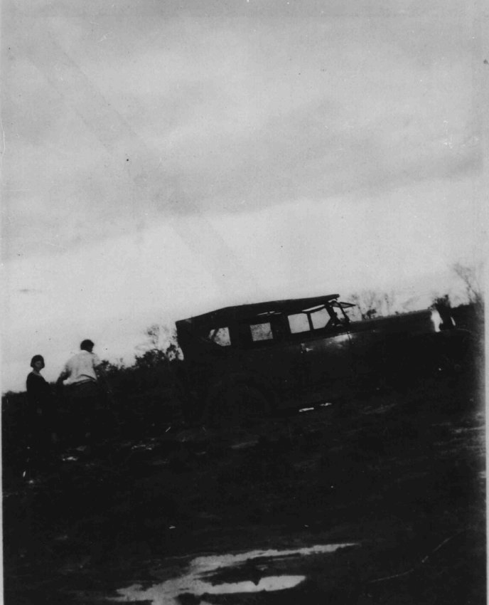Motor car bogged on the black soil plains of Beemery Station, Brewarrina, c. 1930