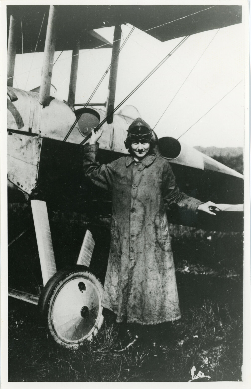 Woman standing in front of an aircraft
