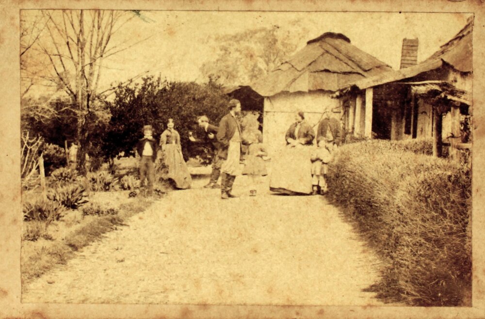 Side view of people in front of Beverley, Bundarra