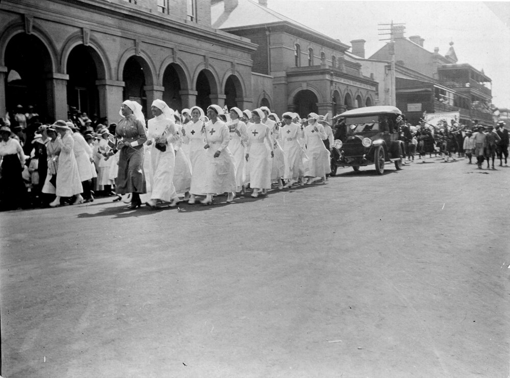 Voluntary Aid Detachment (VADs) march past Post Office, c. 1910