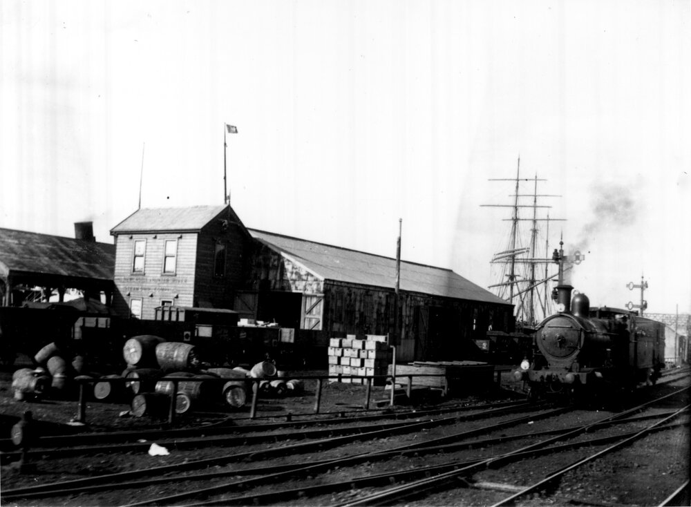 Newcastle Harbour showing train and ship