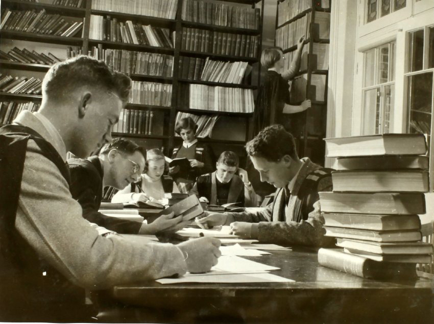 Photo of a group in the Dixon Library, Jim Williams, Jackson, Marg Meale, Gardner, John Hanley, Mal Hardy, Nell