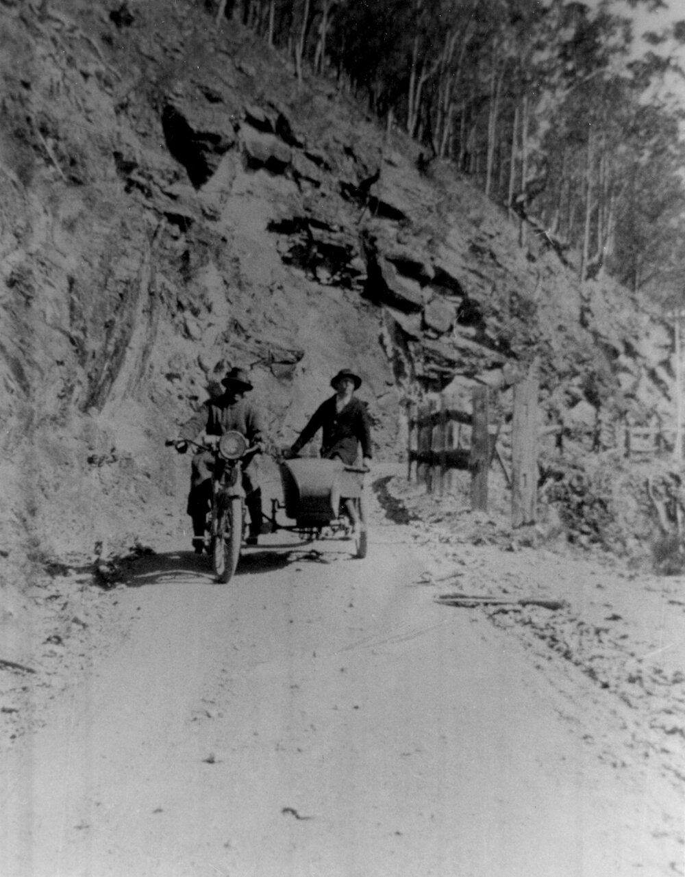 Two men with motorbike and sidecar on Kempsey Road, 1930