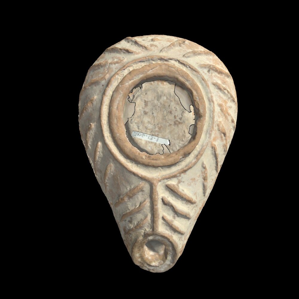 MA2006.13.1 Unglazed terracotta spouted oil lamp