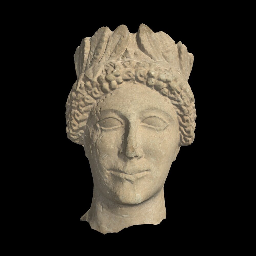 MA2009.10.1 Carved limestone head of a young man