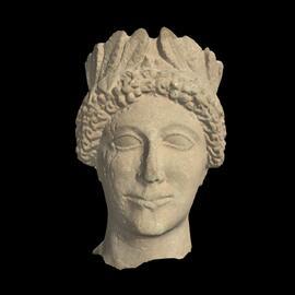 MA2009.10.1 Carved limestone head of a young man