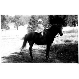 Unidentified child on horseback at Bowral, NSW