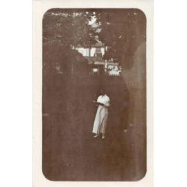 Women reading in front of Terrace House