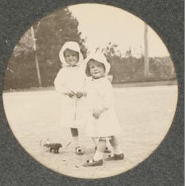 [Two Children and a toy]