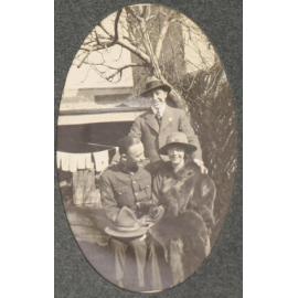 [Two men and a woman]