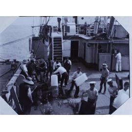 Loading ice on the Kumano Maru