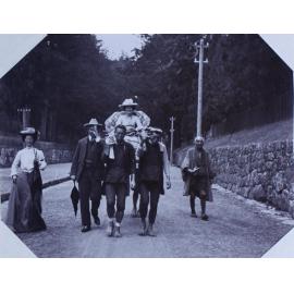 Women in sedan chair
