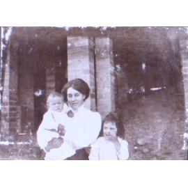 Unidentified woman and two children