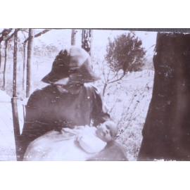 Unidentified woman and baby