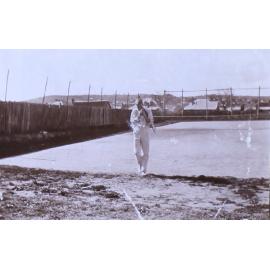 Unidentified man on the tennis court