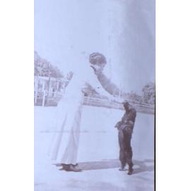 Unidentified woman with pet dog