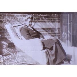 Unidentified woman in an armchair