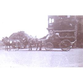 Four horse carriage with unidentified occupants